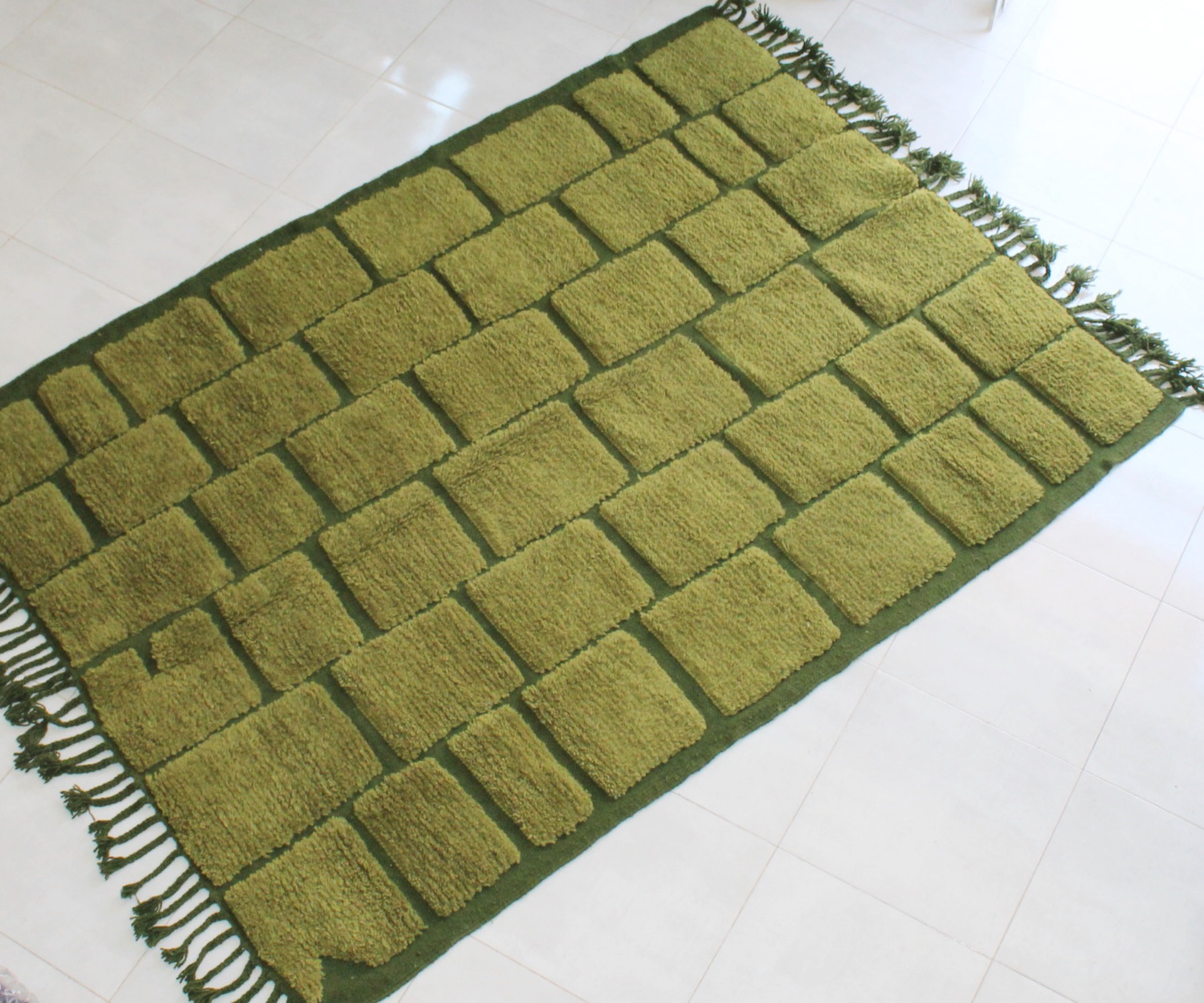Green wool rug